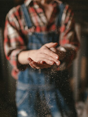 Girl woodworker in a country
