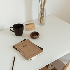 Women's home office workspace. Freelance work, business workplace. Light aesthetic hygge space with...