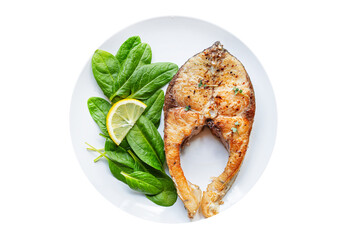 Fried fish carp or silver carp seafood grill bbq portion on the table healthy meal top view copy space for text food background rustic image