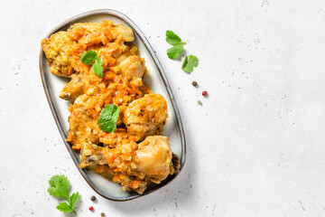 Georgian chicken stew on a dish. Space for text, top view.