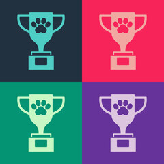 Pop art Pet award symbol icon isolated on color background. Medal with dog footprint as pets exhibition winner concept. Vector