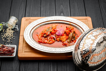 Chicken stew with mushrooms, tomatoes and various vegetables