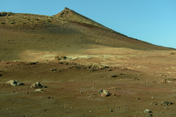 Fototapeta na wymiar Volcanic landscape of Timanfaya national park at Lanzarote on Canary islands, Spain