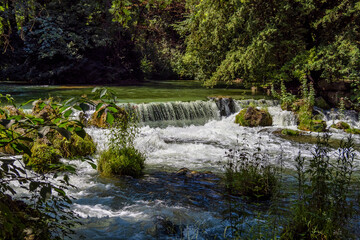 water of the isar in The English Garden, Munich, Germany.