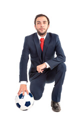 Businessman with soccer ball