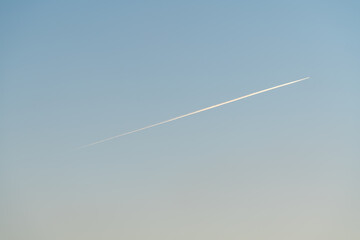 Trail of an airplane crossing the sky