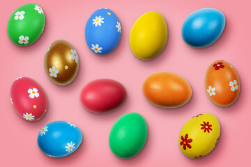 Obraz premium Colorful painted Easter eggs on the pink surface