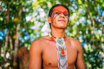 Indian from the Pataxó tribe smiling. Brazilian Indian from southern Bahia with necklace and...