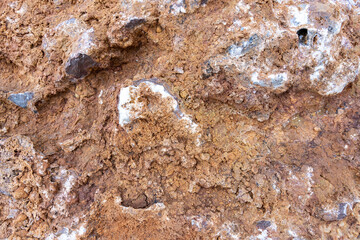 White rock with red oxides close-up as a natural background