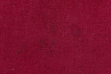 abstract background of an old burgundy woolen furniture upholstery