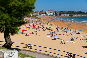 SANTANDER, SPAIN - JULY 14, 2019: Summer view of Santander seafront and sand beach
