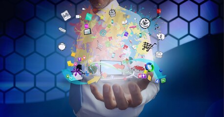 Composition of network of digital icons with laptop over hand of businessman