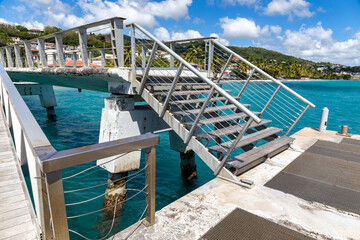 Fototapeta na wymiar Stairs of the pier - Le Diamant, Martinique, French Antilles