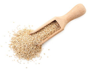 Quinoa in a wooden scoop on a white background, isolated. The view from top