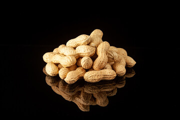 peanuts on black surface