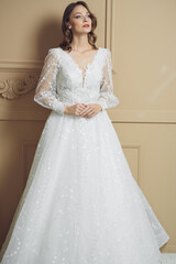 Fototapeta premium portrait of beautiful blonde bride with fashion hairstyle and make-up
