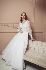 Fototapeta premium portrait of beautiful blonde bride with fashion hairstyle and make-up