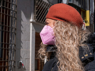 BLOND WOMAN ON THE STREETS OF TOLEDO, SPAIN