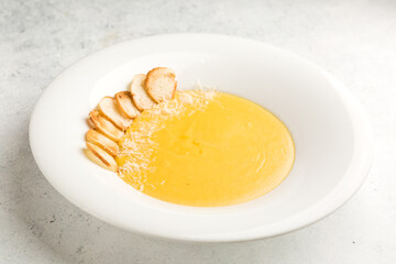 pumpkin puree soup with croutons