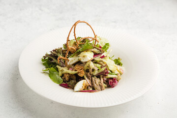 fresh salad of leaves, vegetables and salmon