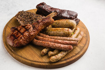 restaurant dish with grilled meat and vegetable side dish