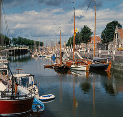 Fototapeta na wymiar Harbour of Zierikzee Zeealnd Netherlands. Harbor with boats. 1990.