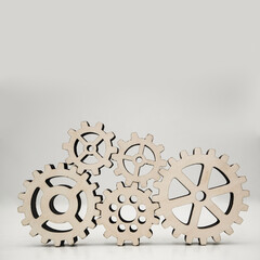 set of five different wooden cog wheels isolated on white background.