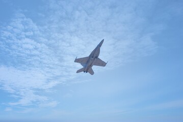Air force fighter planes on display and doing aerial maneuvers