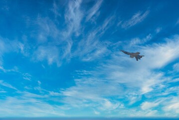 Air force fighter planes on display and doing aerial maneuvers