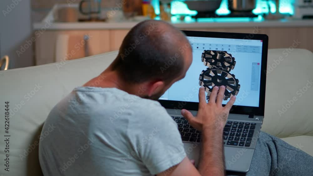 Poster focused architect looking at laptop computer for nerw development of technical construction prototyp