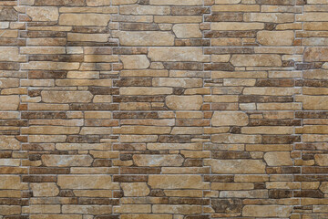 Pattern of stone wall surface. Texture of a stone wall.  Stone wall as a background or texture. Part of a stone wall, for background or texture