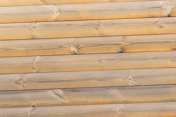 Naklejka premium Natural wood texture. Light wooden wall from beams. Abstract background