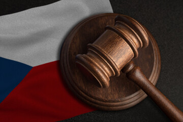 Judge gavel and flag of Czech Republic. Law and justice in Czech Republic. Violation of rights and...