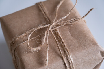 Gift box packaging. Craft paper box. Eco concept. Close-up view.