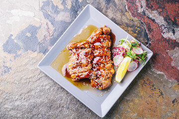 Chinese food. Chicken with sweet and sour sauce.