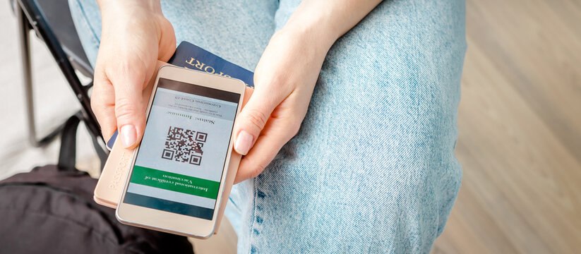 Vaccination Health Passport Woman Shows Digital Health Passport By Phone And Vaccination Certificate Travel Covid 19. New Normal Vaccine Documents