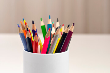 Fototapeta premium Colorful pencils in white cup.
