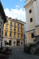 church (st ulrichs), alley and residential buildings in vienna (austria)