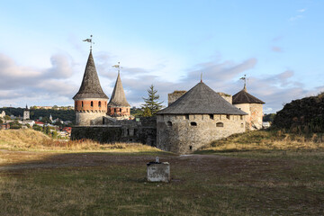 The ancient castle on the background of the modern city. National landmark