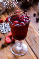 appetizing drink with strawberries and other berries on the table