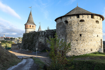 Fototapeta na wymiar The ancient castle on the background of the modern city. National landmark