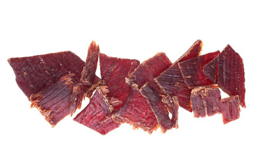 Top view of beef jerky pieces isolated on a white background. Chewy and delicious beef jerky.