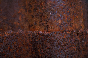 Grunge rusted corrugated galvanized iron background texture. Detail view of old rusty corrugated metal sheet.