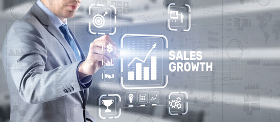 Sales Growth Man clicks inscription on virtual 3D screen