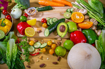 Healthy food clean eating selection: fruit, vegetable, seeds, superfood, leaf vegetable and mediterranean dishes. Detox and clean diet. Foods high in vitamins, minerals and antioxidants.