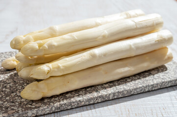 New harvest of high quality Dutch white asparagus washed, uncooked