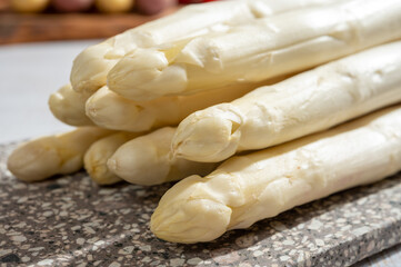 Fototapeta na wymiar New harvest of high quality Dutch white asparagus washed, uncooked