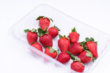 Fresh strawberries in plastic punet, ready to be consumed