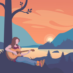A woman plays a guitar at sunset. Relaxing atmosphere of mountains and lakes at sunset.