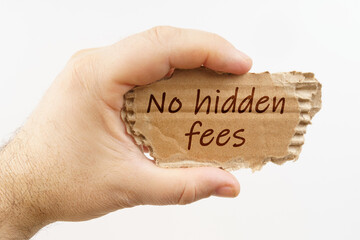 A man holds a cardboard in his hand on which it is written - No hidden fees